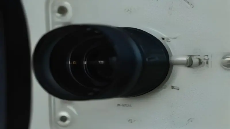 A close-up of an electrical motor's nameplate displaying current ratings.